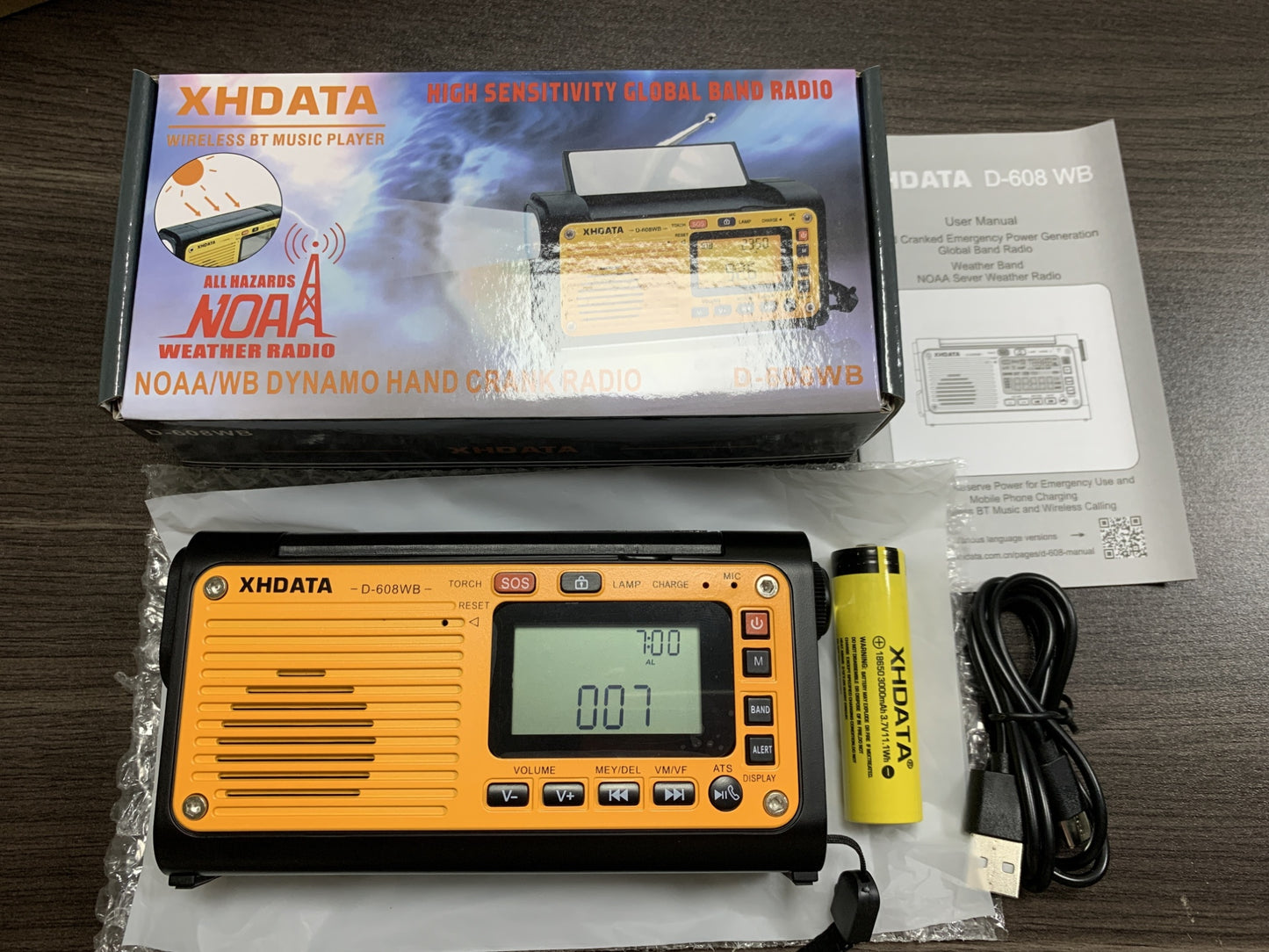 Hand-cranked Solar-powered Radio With Outdoor Emergency And Bluetooth Charging Features