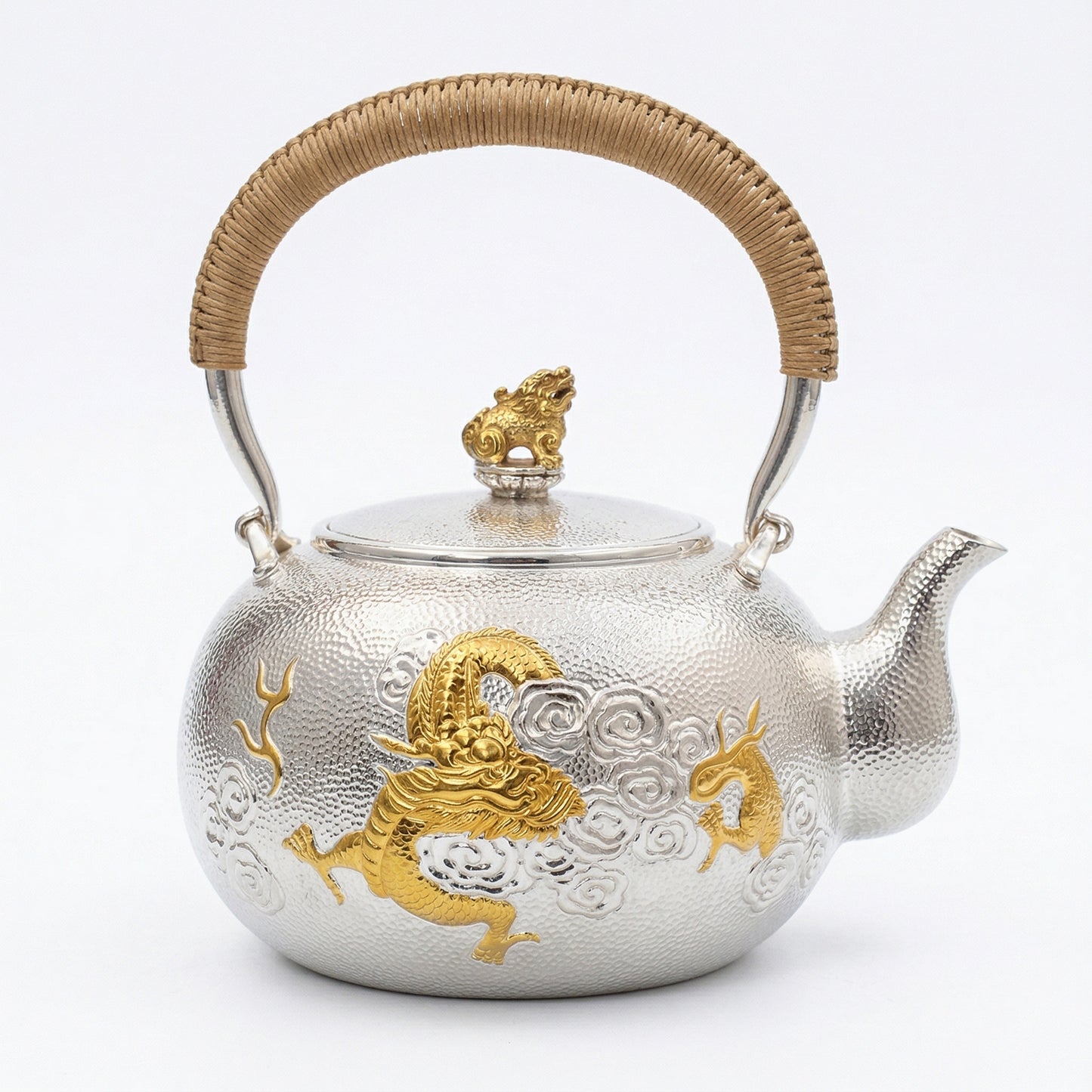 Pure 999 Fine Silver Handcrafted Hammered Silver Tea Kettle with Dragon Relief and Traditional Rattan Handle - Handicraft