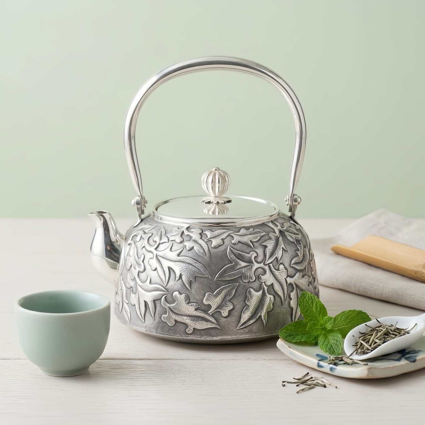 925 Sterling Silver Handcrafted Silver Tea Kettle with Intricate Leaf Relief and High Arched Handle - Handicraft