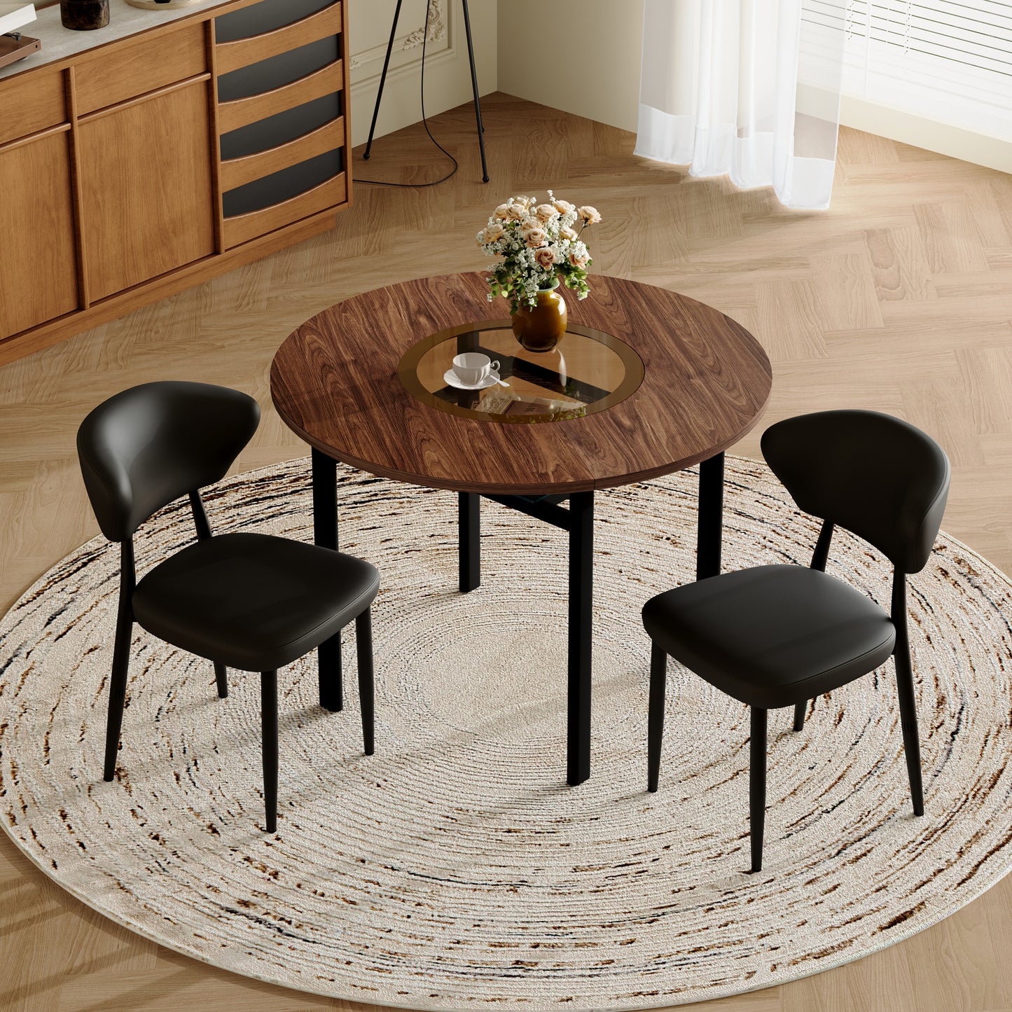 Modern Minimalist Round Table Set  With 2 Black Armchairs Made Of PU Material With Curved Backrest , Round Table With 100 Cm Diameter In Wood Look, Suitable For Dining Room & Kitchen.
