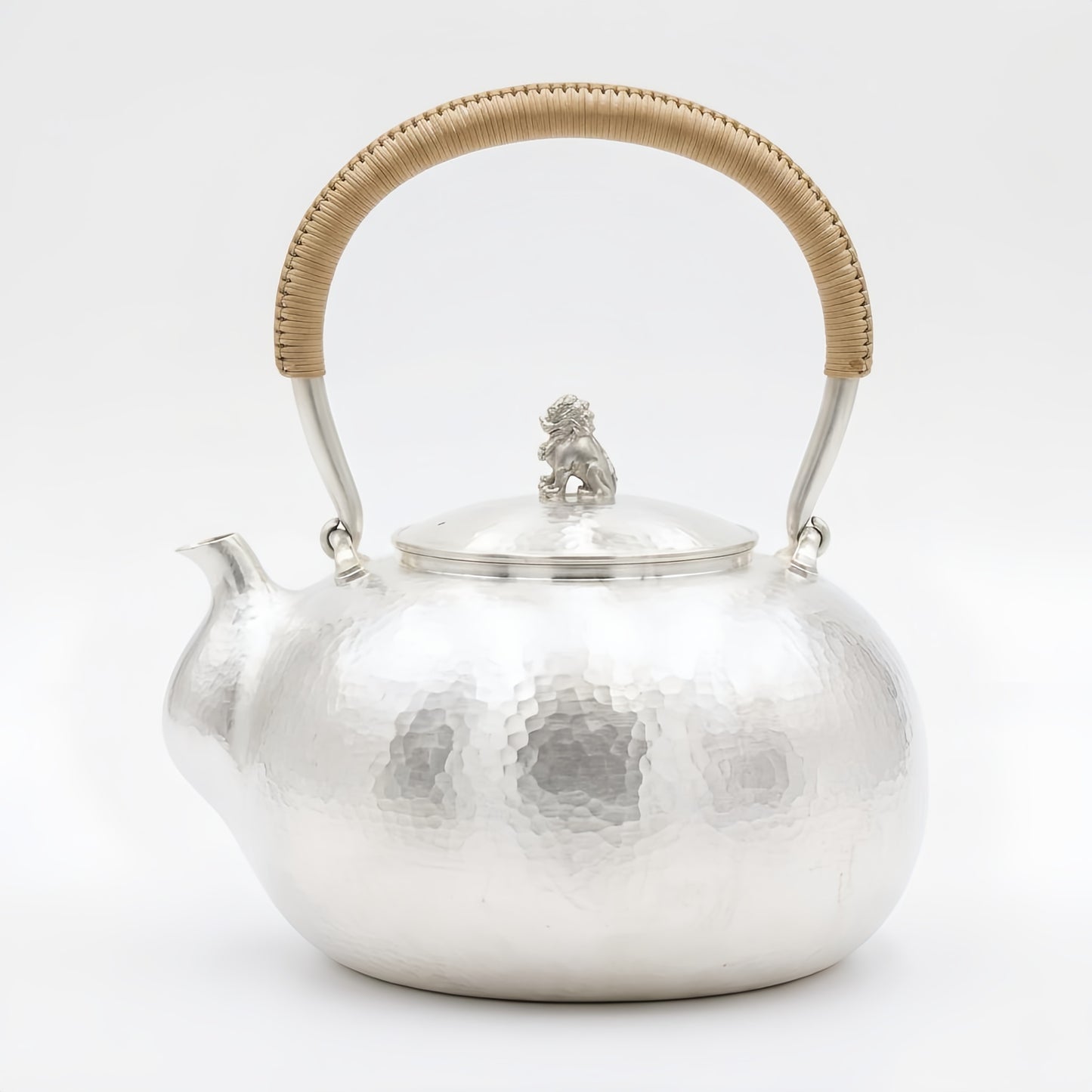 Pure 999 Fine Silver Hammered Silver Tea Kettle with Lion Finial and Rattan-Wrapped Handle - Handicraft