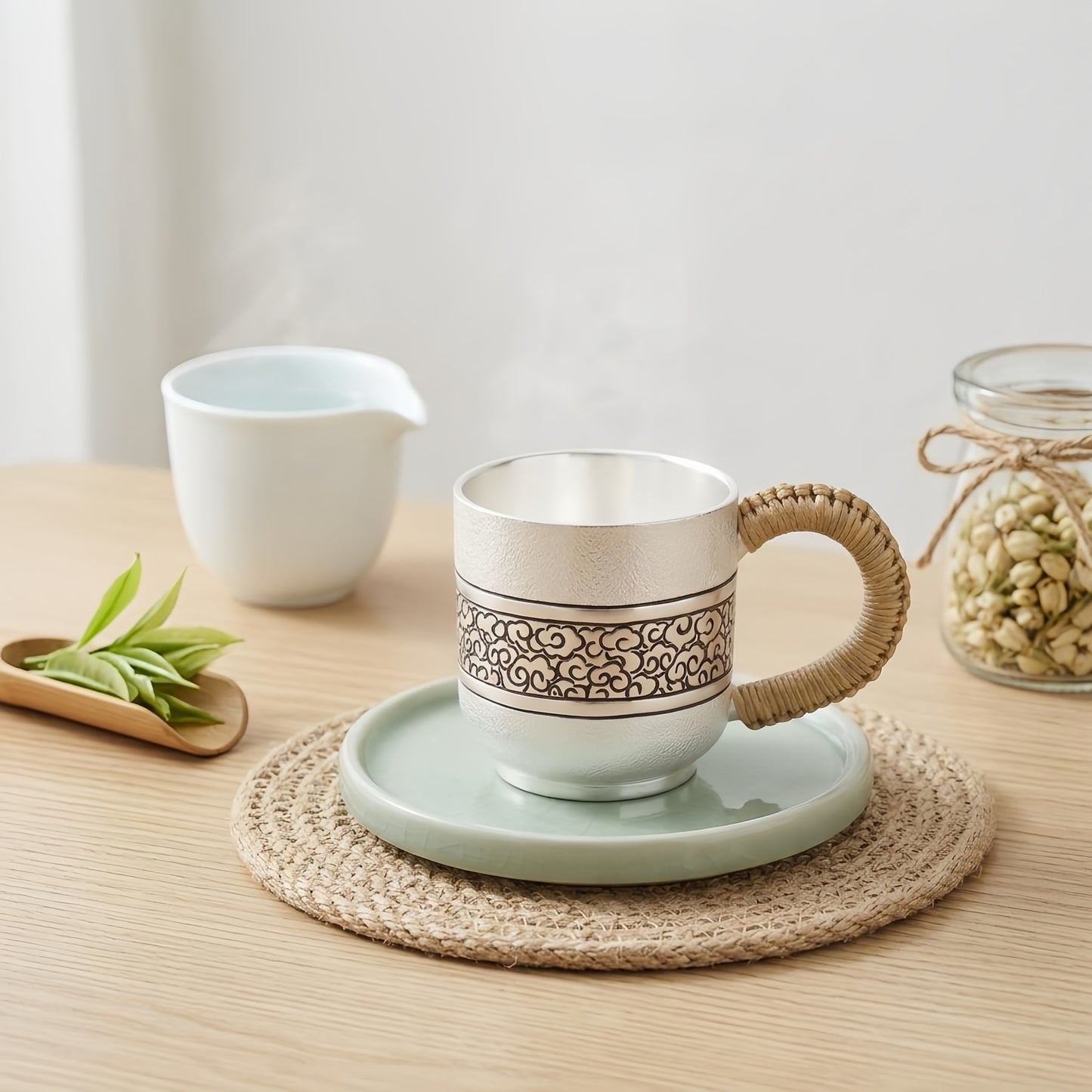 Pure 999 Fine Silver Handcrafted Silver Tea Cup with Engraved Cloud Pattern and Woven Grip Handle - Handicraft