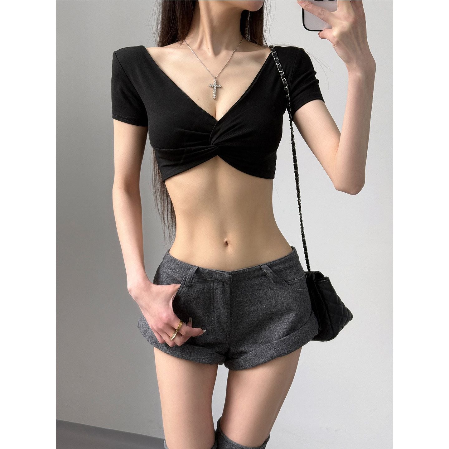 A Short-sleeved T-shirt With A Deep V-neck And A Defined Waistlinea Korean-style Cropped Top Perfect For Layering