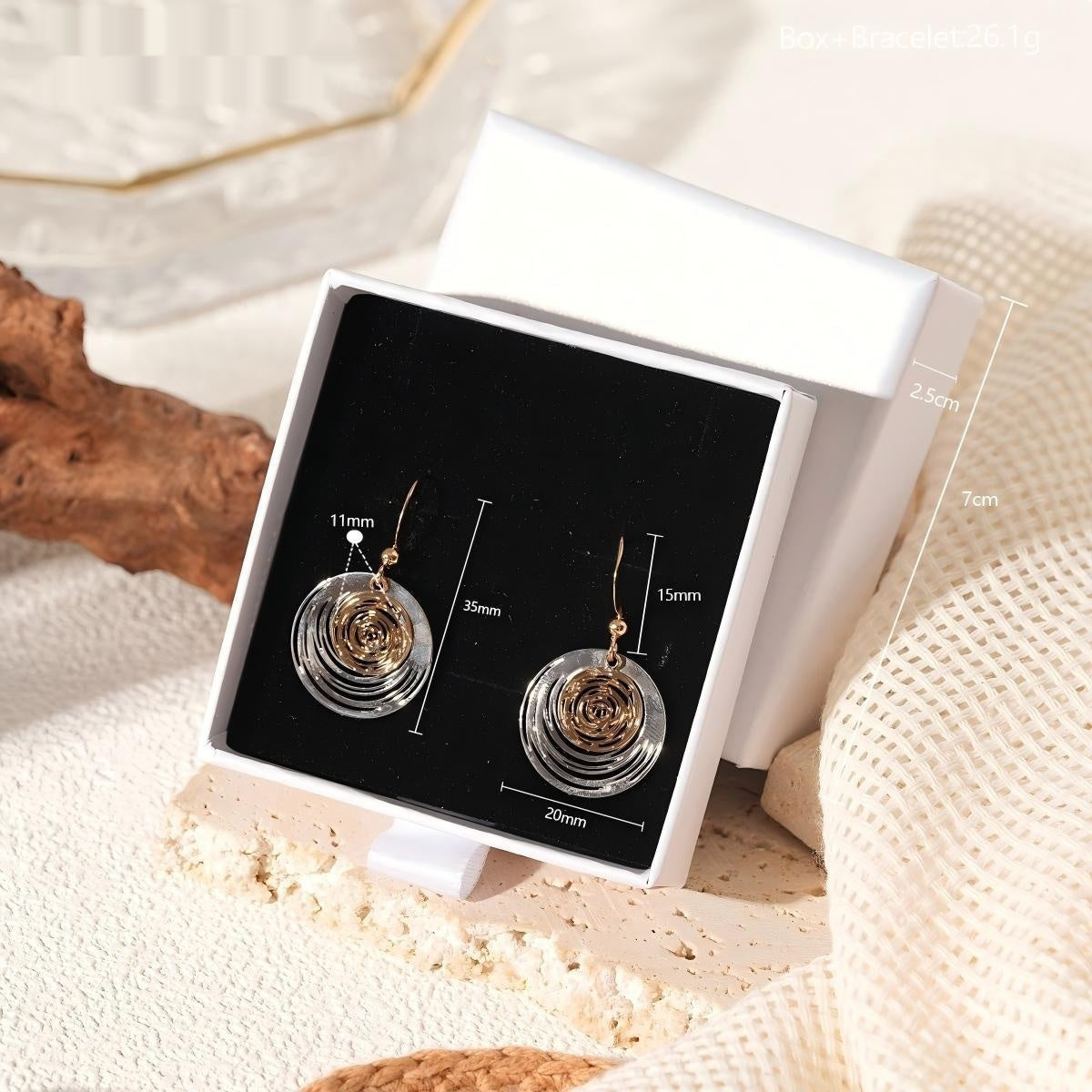Women's Fashion Versatile Steel-colored Vortex-shaped Earrings