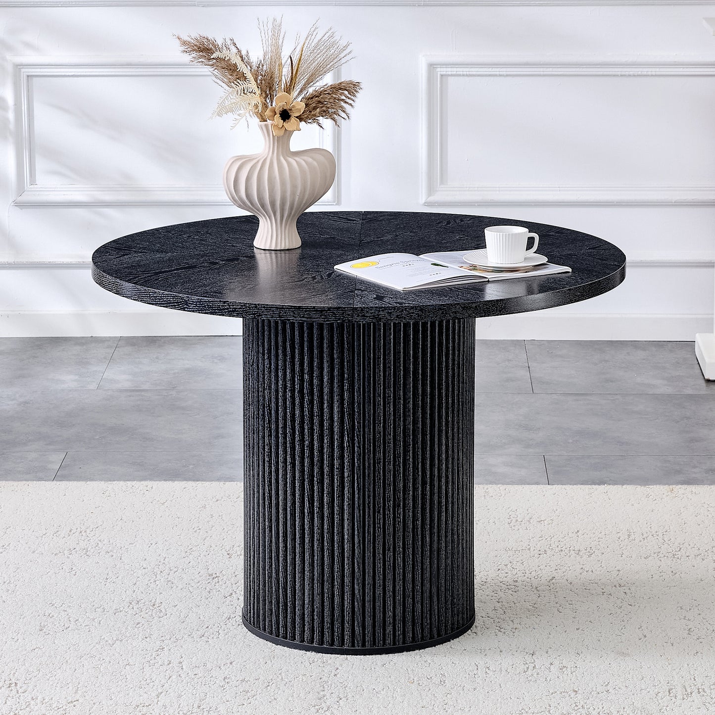 A Modern Spliced Circular Dining Table With A Diameter Of 42 Inches, Featuring Black Wood Color Textures Fan-shaped Diagonal Color Splicing Board Design, Interpreting Home Aesthetics And Practicality.