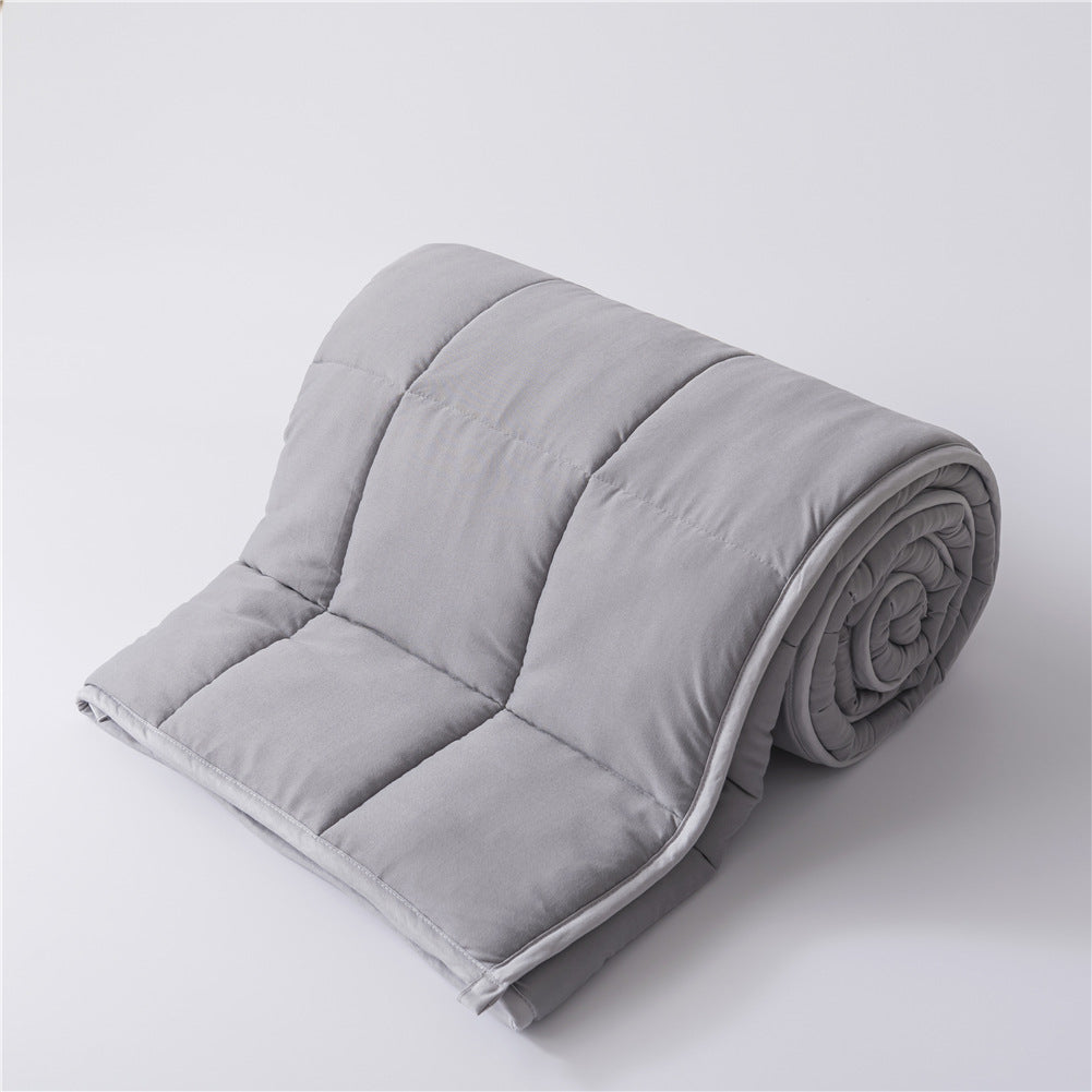 Amazons Cooling Gravity Blanket Is Weighted With Glass Beads