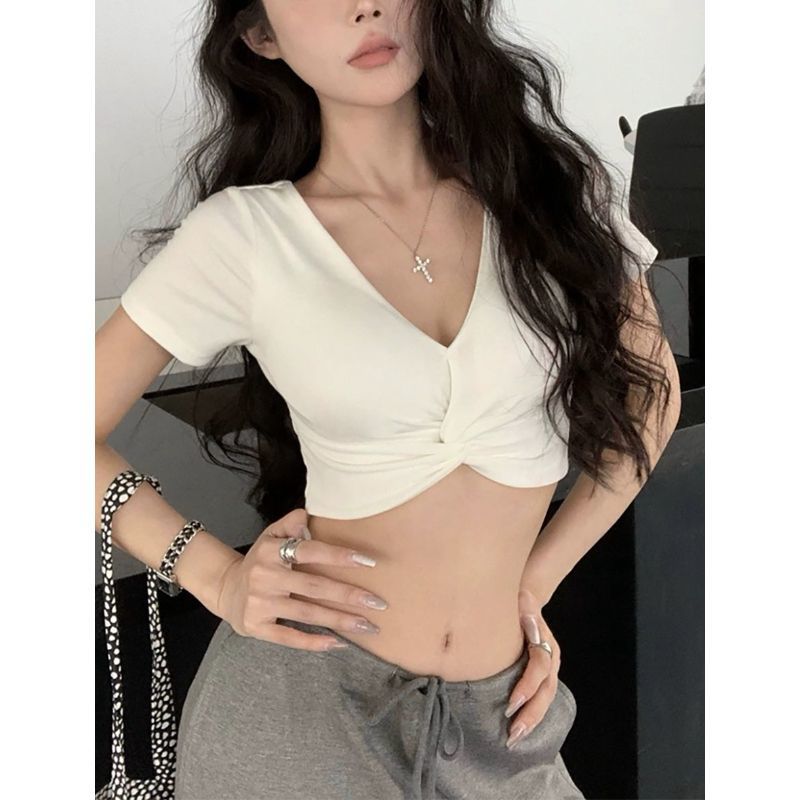 A Short-sleeved T-shirt With A Deep V-neck And A Defined Waistlinea Korean-style Cropped Top Perfect For Layering