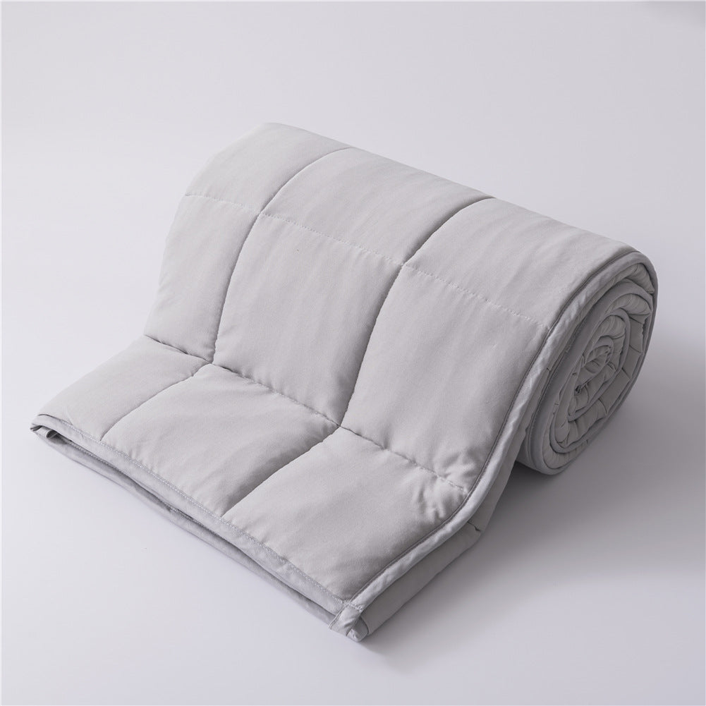 Amazons Cooling Gravity Blanket Is Weighted With Glass Beads