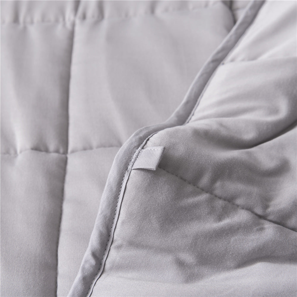 Amazons Cooling Gravity Blanket Is Weighted With Glass Beads