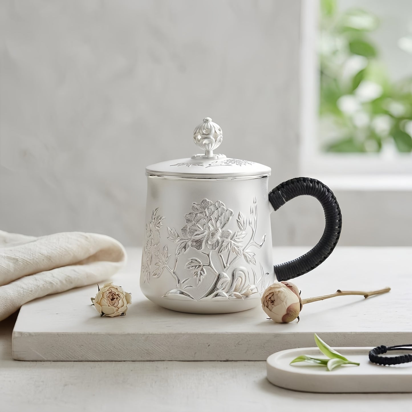 925 Sterling Silver Ornate Handcrafted Silver Tea Mug Featuring Floral Relief, Decorative Lid, and Black Braided Handle - Handicraft