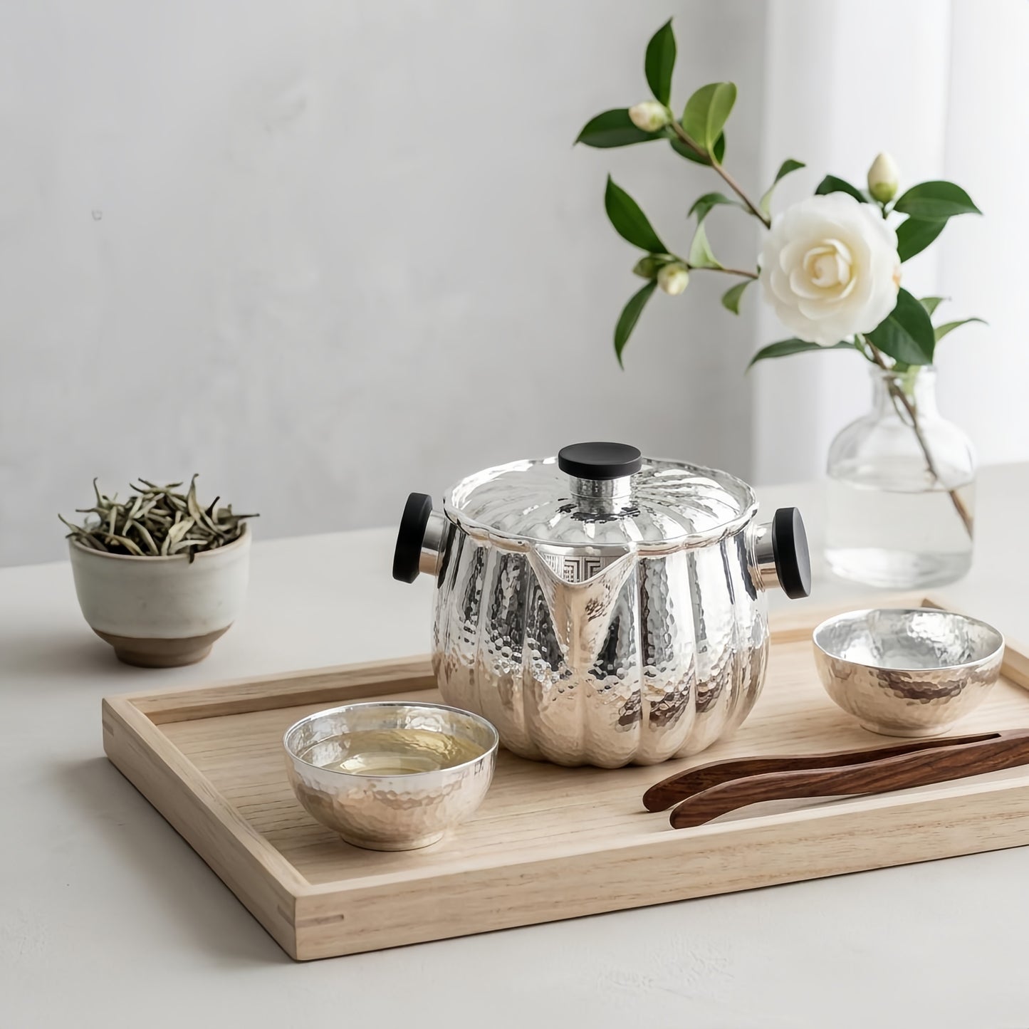 Pure 999 Fine Silver Exquisite Hammered Sterling Silver Pumpkin-Shaped Teapot with Black Handles for Elegant Tea Service - Handicraft