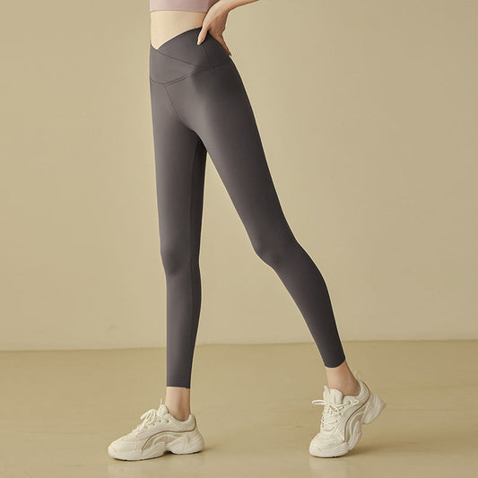 Womens High-Waisted Butt-Lifting Yoga Pants With A Crossed Waist Design For A Bare-Leg Look