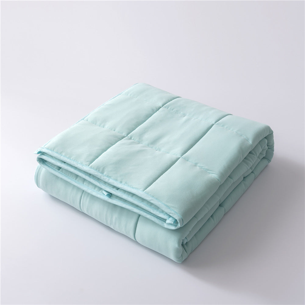 Amazons Cooling Gravity Blanket Is Weighted With Glass Beads