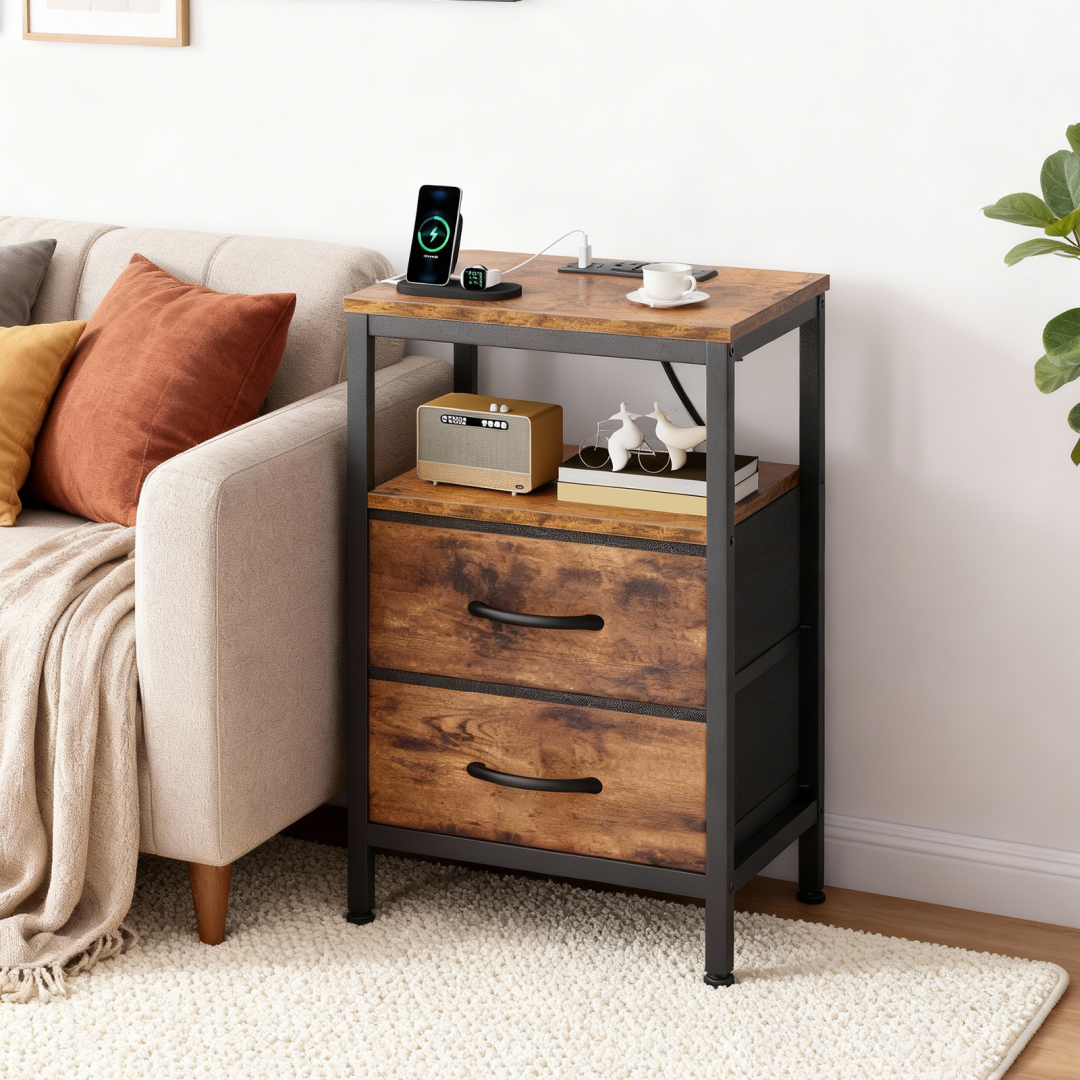 A Small Bedside Table With A Charging Station And Two Fabric Drawers, And A Side Bedside Table