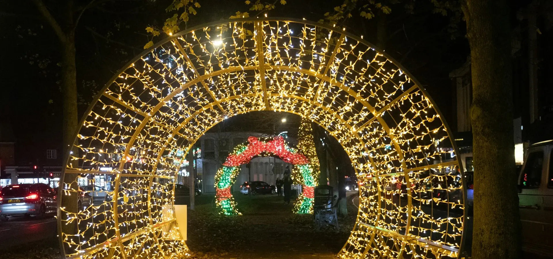 A welcoming archway of golden winter lights. Shop Outdoor Lights.
